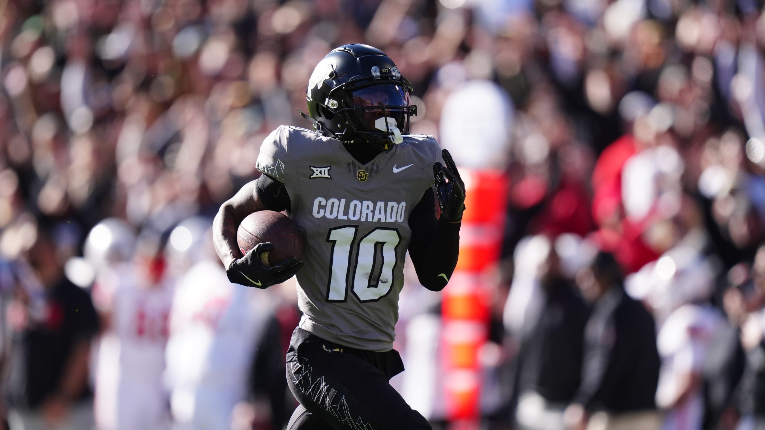 Baltimore Ravens rookie LaJohntay Wester receiving one-on-one coaching from John Harbaugh